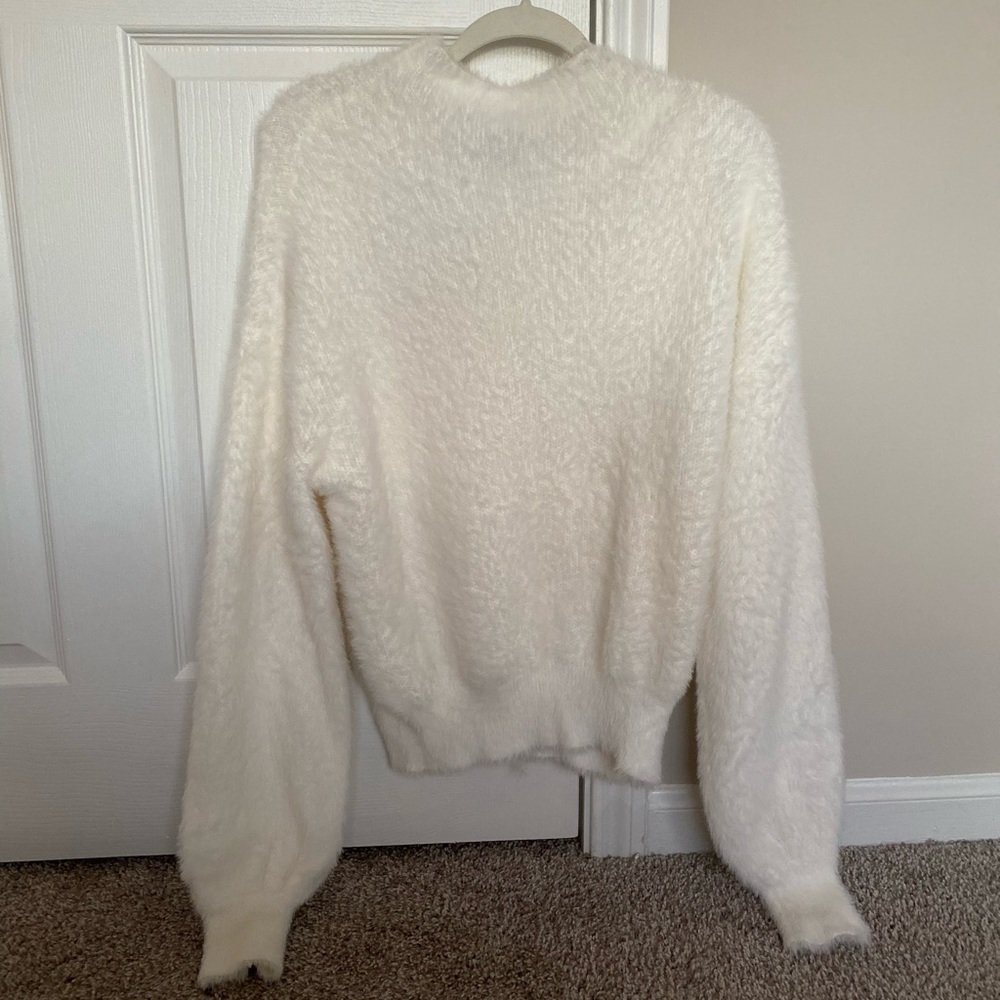 White fuzzy sweater